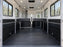 Horse trailer wall liner with a padded center divider between two stalls
